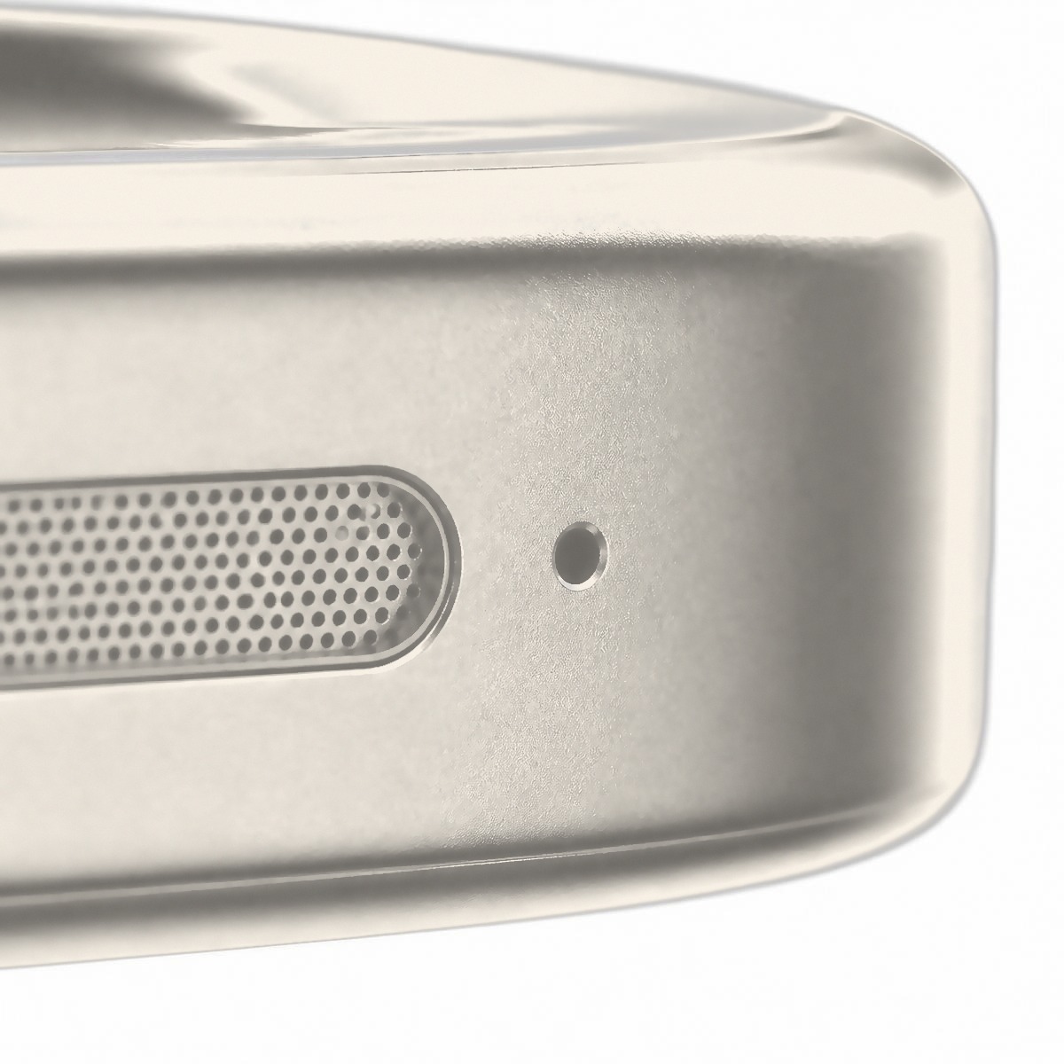Macro view of the speaker grille and microphone pinhole